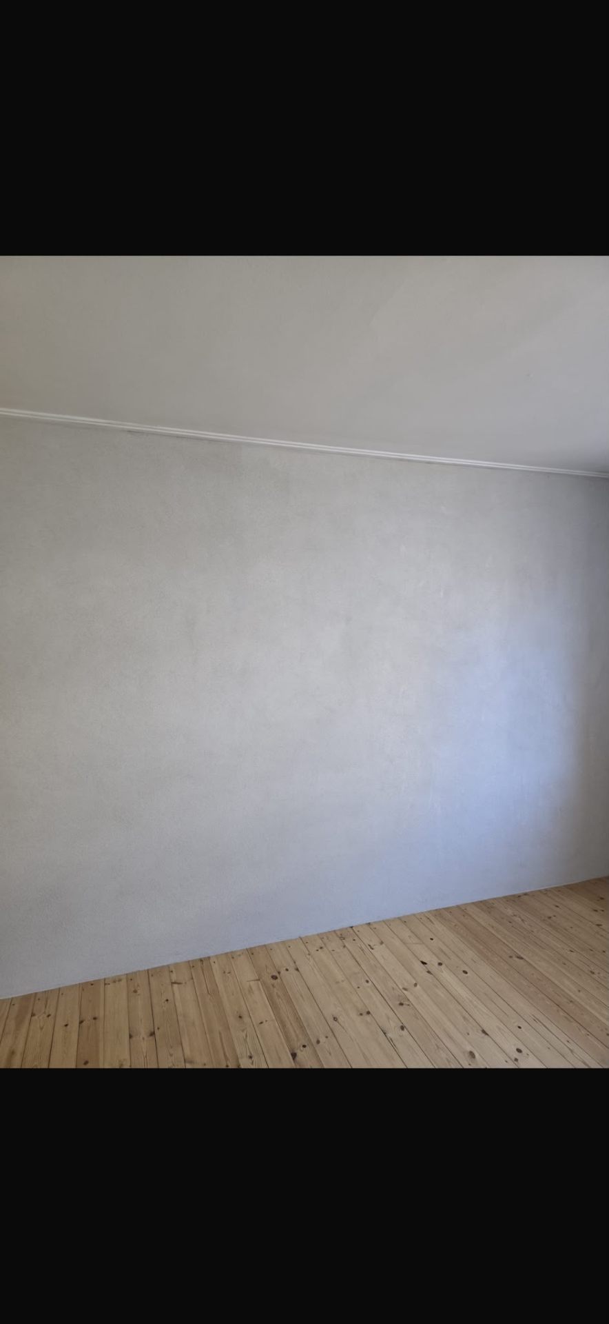 Slätputsad innervägg efter totalputs i Malmö